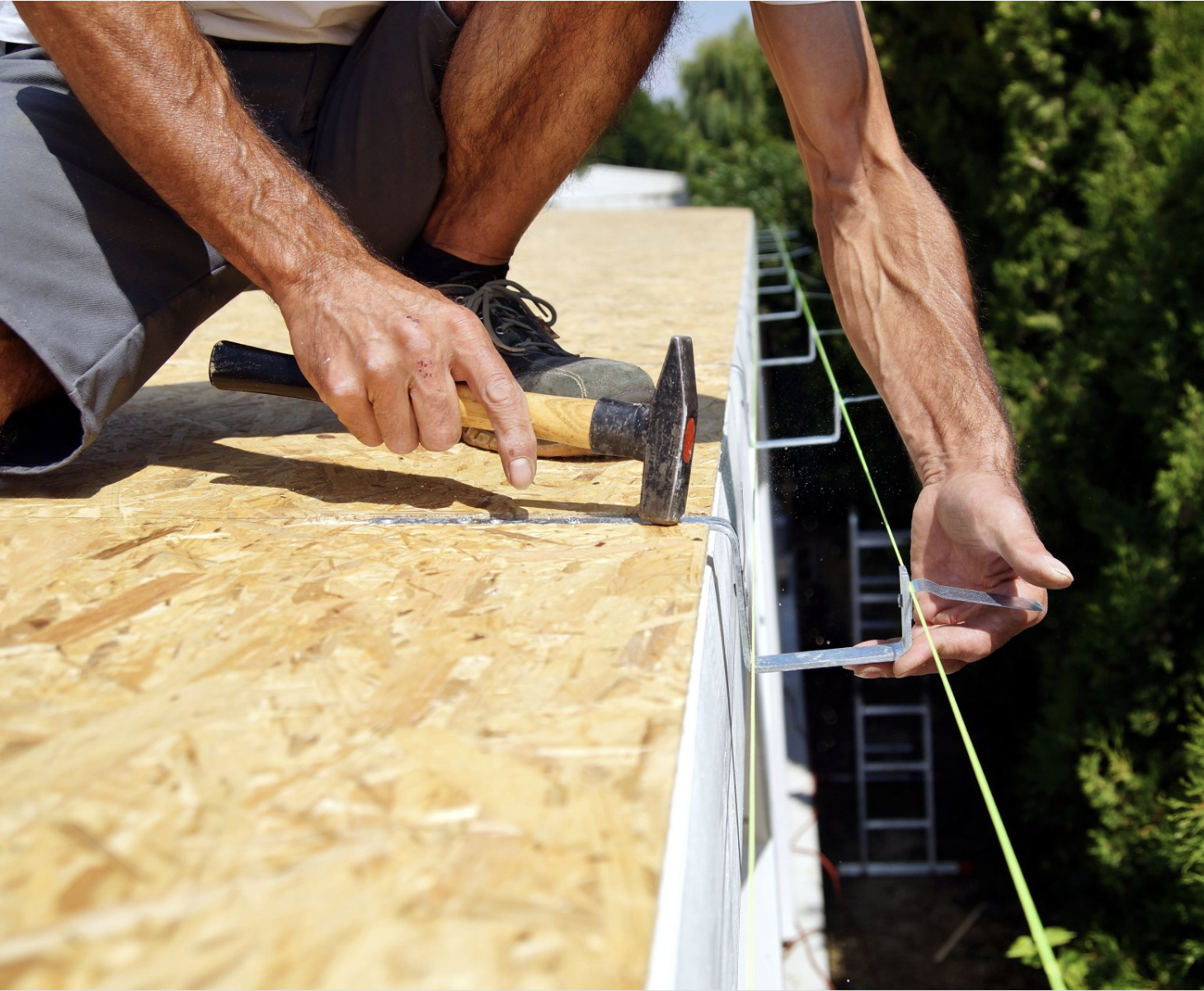 Expert technician inspecting a gutter system for repairs