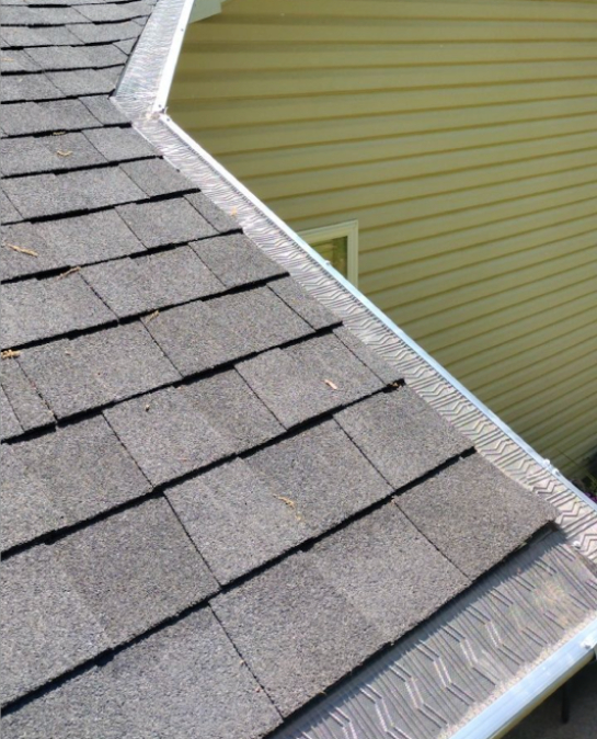 Seamless gutter installation on a residential home in Franklin County, AR