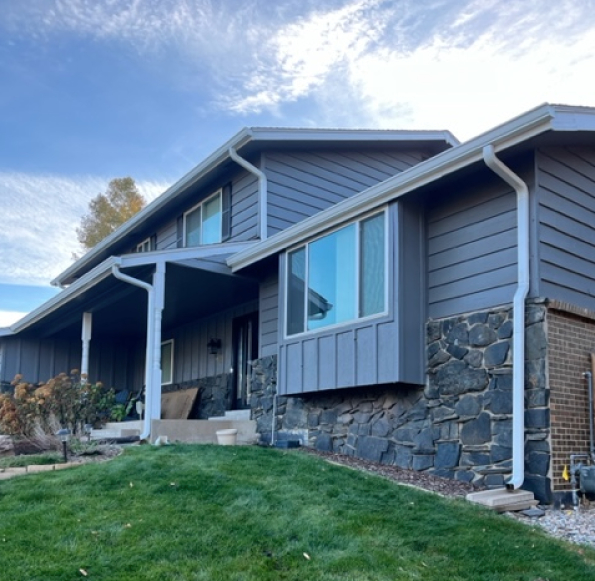 Close-up of durable gutters protecting a home from water damage